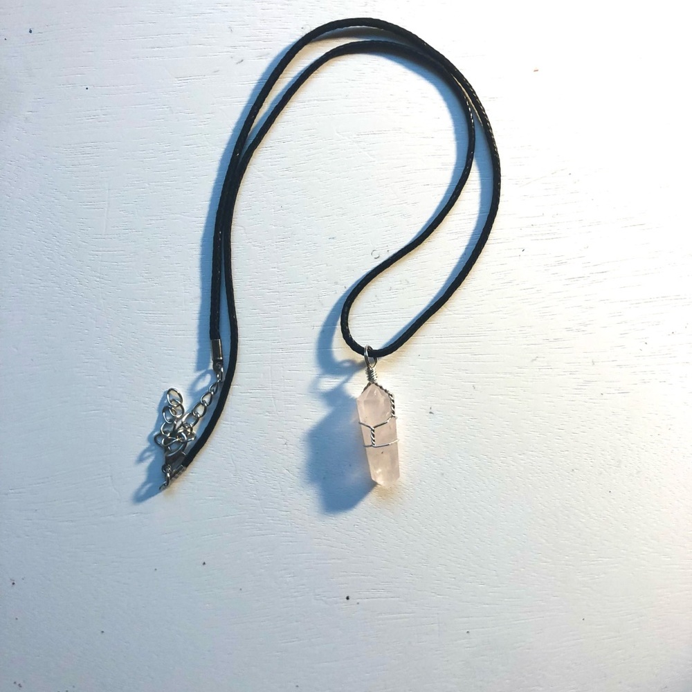 Rose quartz necklace with a black strap
